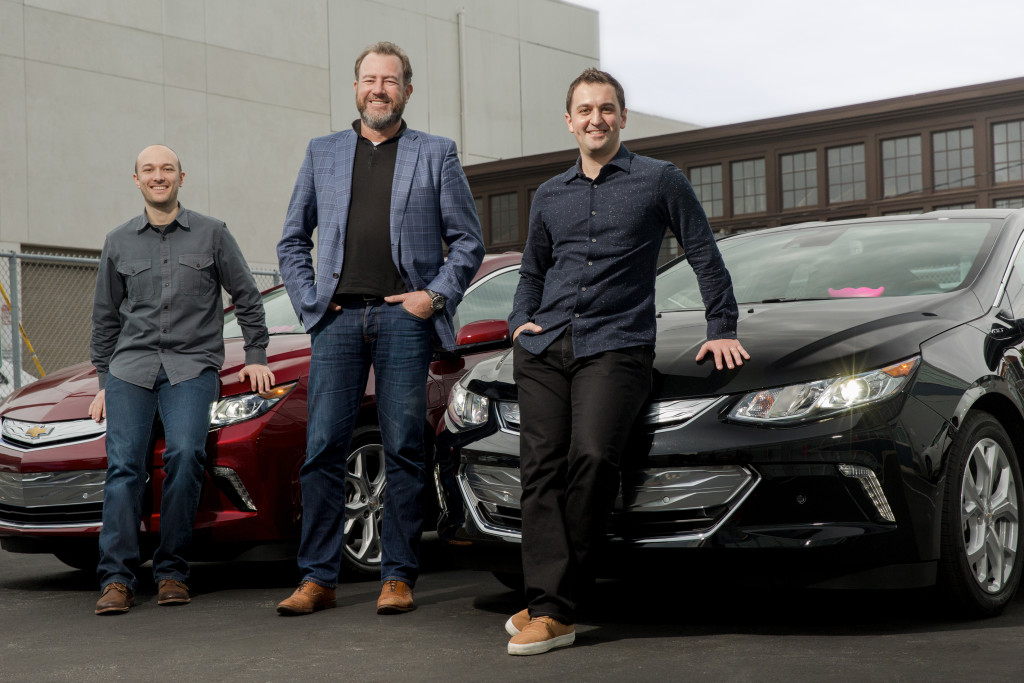 General Motors President Dan Ammann (center) with Lyft Inc. co-founders John Zimmer (right) and Logan Green (left)