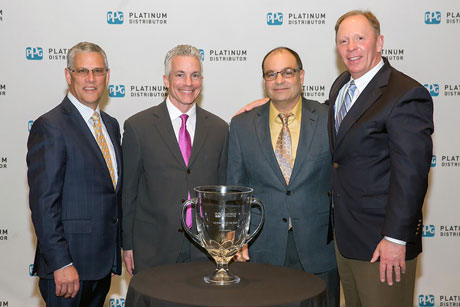 PPG President and CEO Michael McGarry (far left) and John Outcalt (far right), PPG vice president, global automotive refinish, present the 2015 Platinum Distributor of the Year award to Steven Choiniere (left center), president and owner, and Steve Lauro, sales manager, of Color Systems.