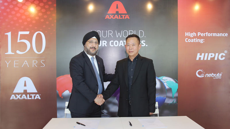 From left: Mr. Sobers Sethi, Axalta Vice President, East and South Asia and Mr. Kee Seong Ng, Managing Director, High Performance Coatings completing Axalta’s acquisition of the High Performance Coatings. 